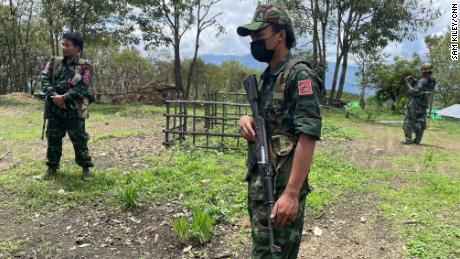 Fighters from the Chin National Army are seen at their base.